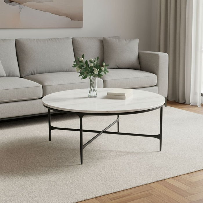 HomeRoots 55-inch marble and iron round coffee table with white marble top and black cross legs, modern living room furniture.