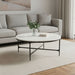 HomeRoots 55-inch marble and iron round coffee table with white marble top and black cross legs, modern living room furniture.