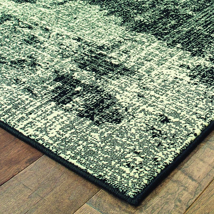 9' x 12' Machine Woven Abstract Indoor Area Rug - Black Ivory