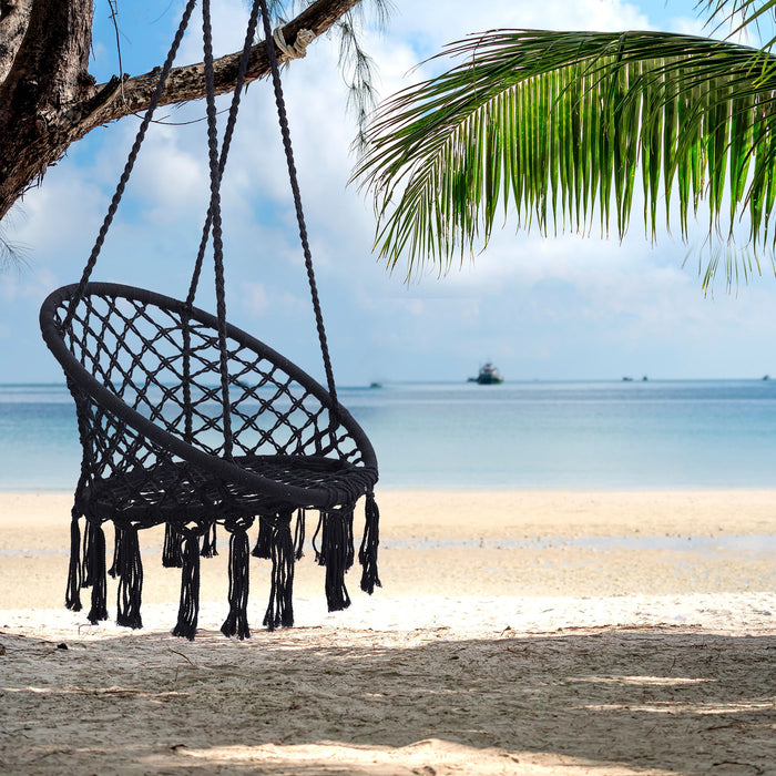 Giga macrame hanging hammock chair with rope swing design for indoor or outdoor use, featuring woven texture and sturdy support.