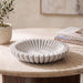 Decorative Valenza bowl by Meridian Furniture featuring a stylish, artistic design perfect for table decor or display.