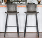 Set of two gray and black steel low back bar height chairs by HomeRoots, featuring modern design and durable metal construction.