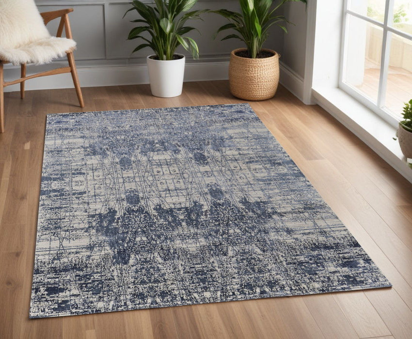 4' x 6' Abstract Hand Woven Worn Faded Area Rug - Ivory And Blue
