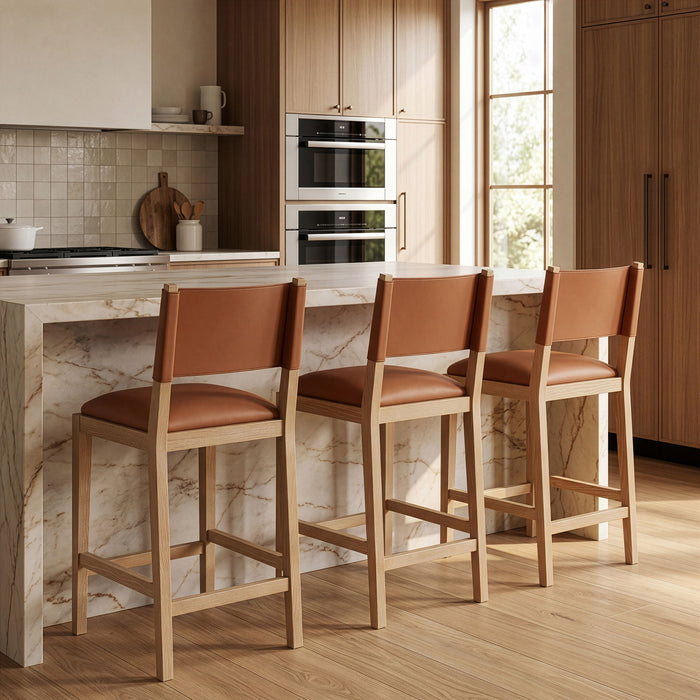Avon vegan leather counter stool by Meridian Furniture, 24-27 inch height, modern design with cushioned seat and metal legs.