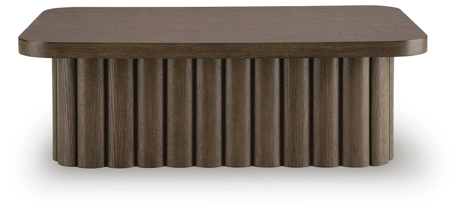 Rectangular cocktail table from Signature Design by Ashley® with a sleek wooden finish and modern design.