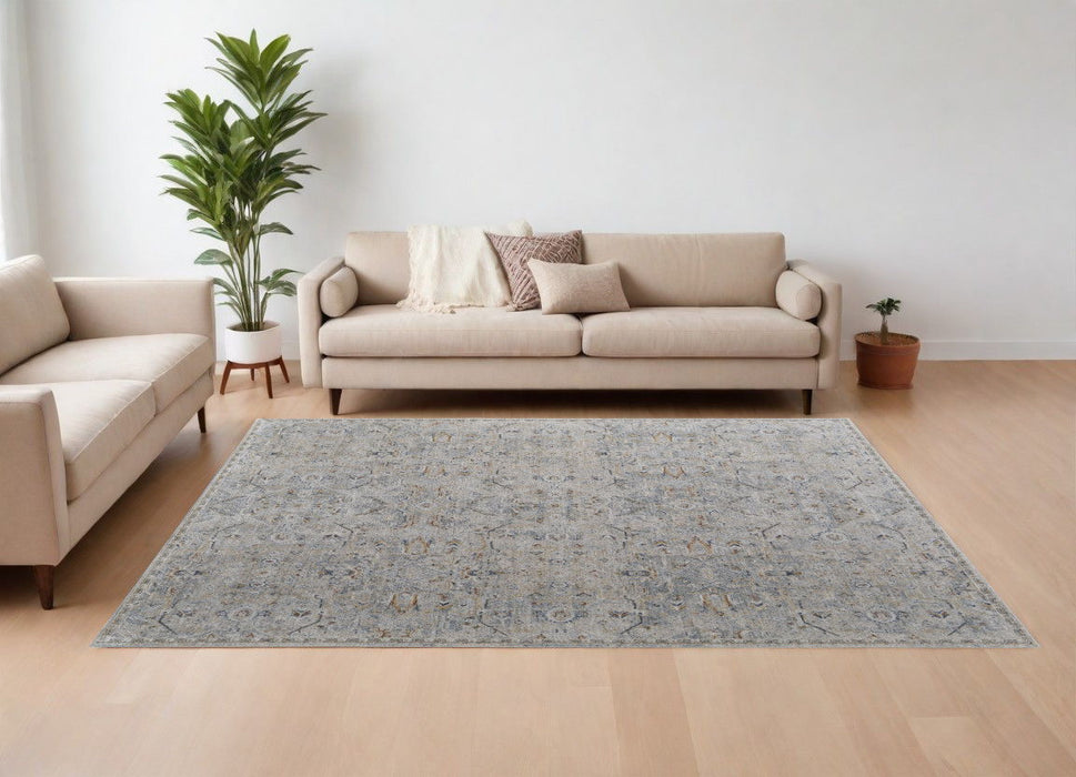 9' x 13' Abstract Power Loom Worn Faded Area Rug With Fringe - Ivory Tan And Blue