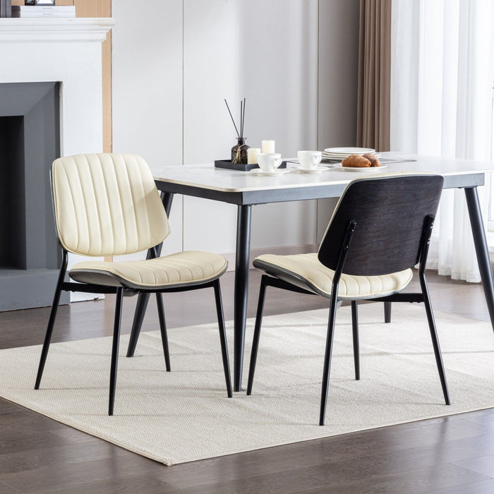 Set of 2 Giga mid-century modern retro dining chairs with walnut bentwood backs, upholstered seats, and metal legs.