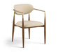 Vegan leather upholstered dining arm chair with walnut legs from Meridian Furniture, showcasing a modern design and plush seating.