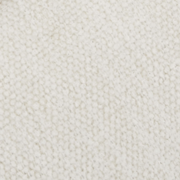 Giga cozy upholstered cushion armchair with soft fabric and plush cushioning, perfect for a modern living room setting.