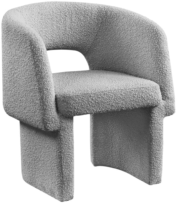 Emmet Boucle Dining Chair by Meridian Furniture, armchair with plush boucle fabric and modern accent design, shown in a stylish setting.