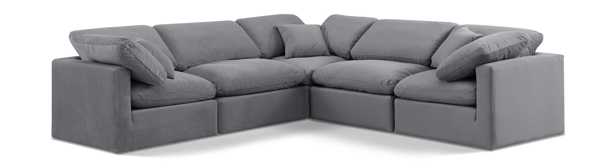 Velvet Meridian Furniture Indulge 5-piece modular corner sectional in a plush, comfortable stationary sofa with soft fabric.
