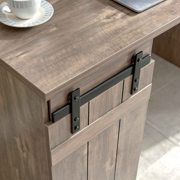 Giga home office desk in light brown with one cabinet, three shelves, faux barn door, metal euro hinges, and modesty panel.
