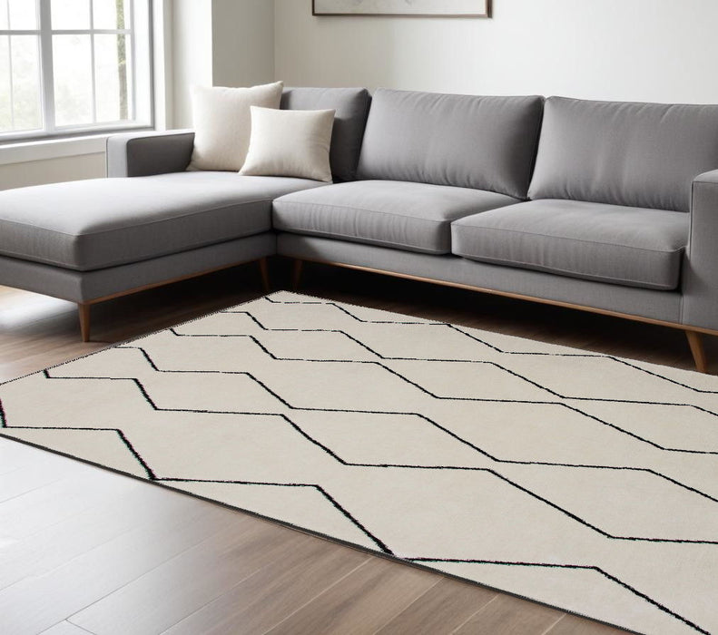 7' x 10' Geometric Power Loom Distressed Non Skid Area Rug - Beige And Black