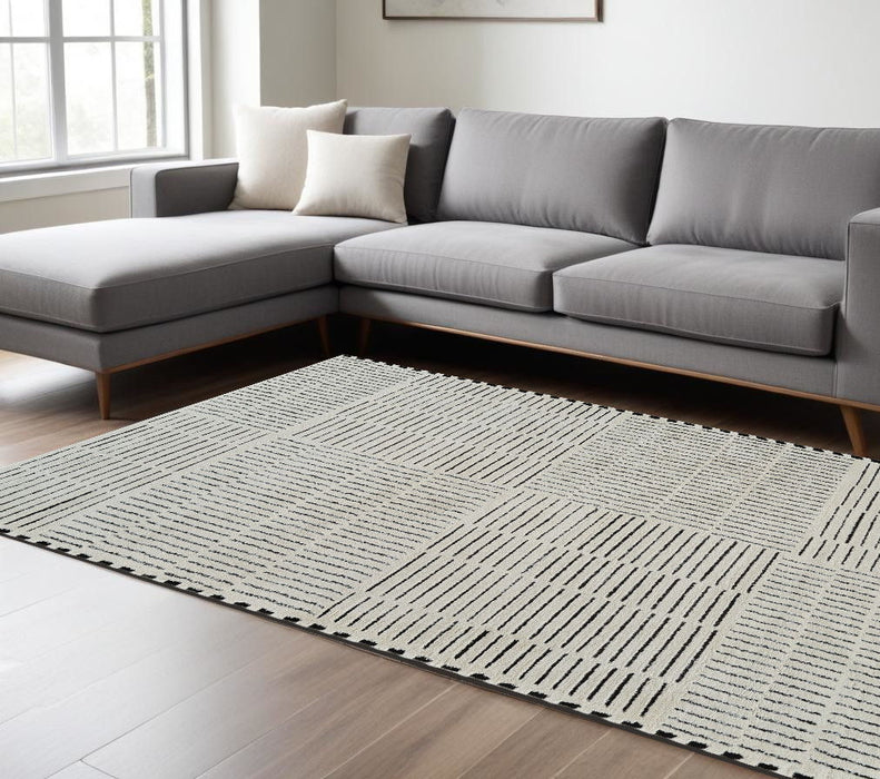 7.9' x 7.9' Abstract Distressed Polypropylene Area Rug - Cream And Black