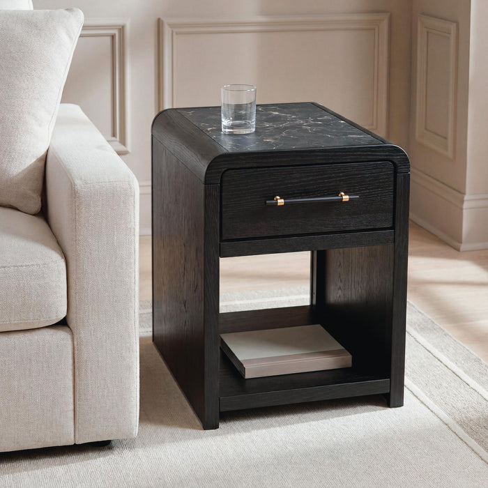 Rectangular cocktail table from Signature Design by Ashley, featuring a modern wooden top and sleek metal legs.