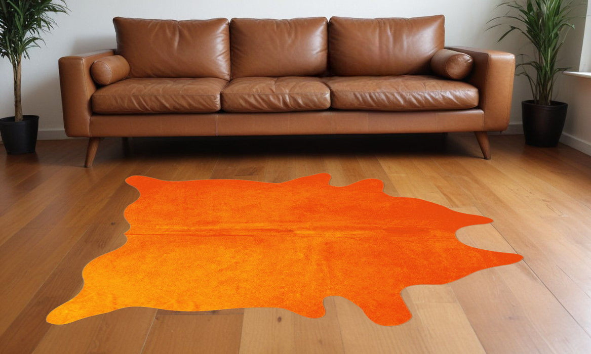 60" x 84" Cowhide Area Rug - Orange
