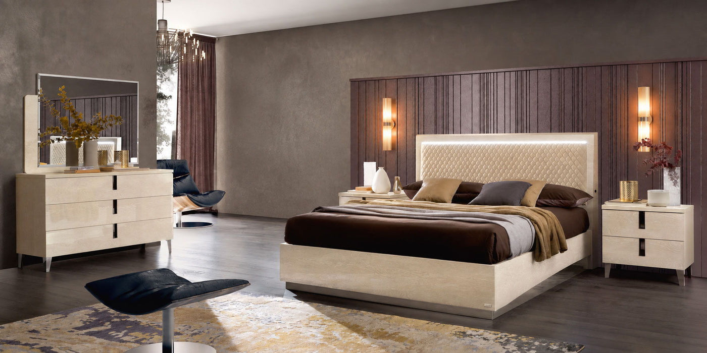 Light beige Ambra Rombi Queen Size upholstered bed by Camelgroup Italy, showcasing the padded headboard and elegant design.