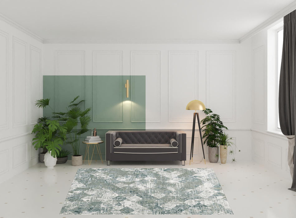 8' x 10' Patchwork Distressed Stain Resistant Area Rug - Green And Ivory