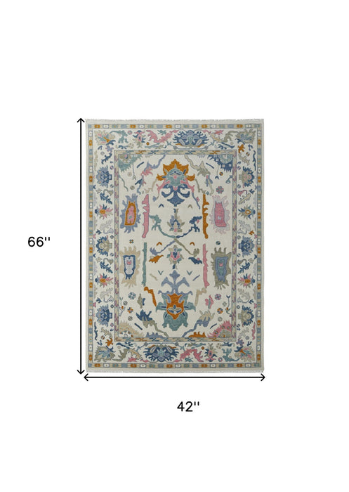 4' x 6' Wool Floral Hand Knotted Area Rug With Fringe - Blue Ivory And Pink