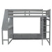 Gray Giga full size gaming loft bed with desk, storage shelves, LED lighting, and hanging clothes rack in a modern bedroom setup.