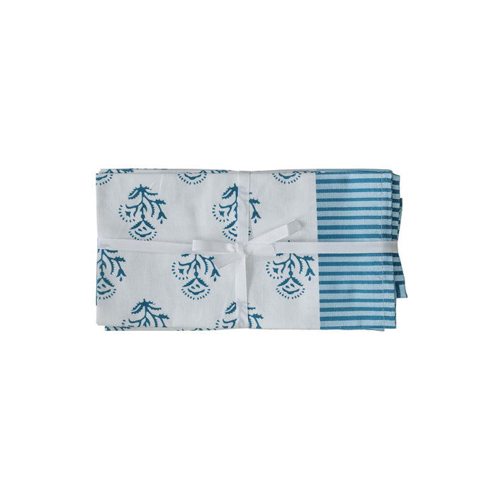 Set of four TOV Furniture Crissy cotton canvas printed napkins with blue vintage floral design.
