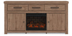 Signature Design by Ashley Garistyn TV stand with built-in fireplace option, featuring a modern wooden design and ample storage.