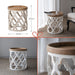 French country decor set by Giga with artificial plant, vase, trays, stool, and side table in multicolor for living room styling.