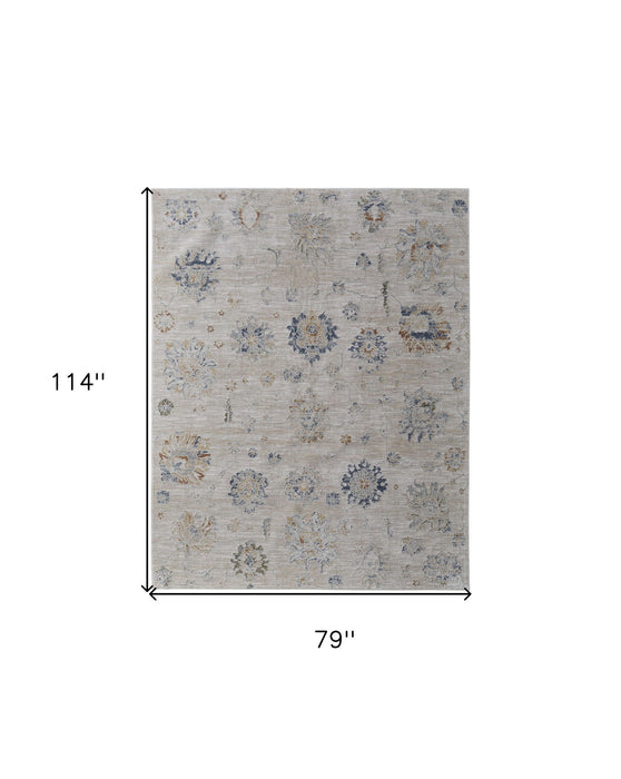 7' x 10' Floral Power Loom Worn Faded Area Rug With Fringe - Ivory Taupe And Blue