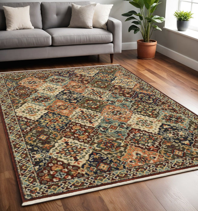 5' x 8' Oriental Power Loom Stain Resistant Area Rug With Fringe - Red Rust Navy Light Blue Brown Orange Ivory And Gold