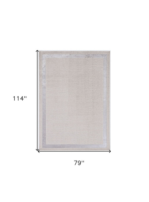 7' x 10' Machine Woven Bordered Indoor Area Rug - Ivory Silver