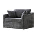 Giga farmhouse armchair with two bolster pillows, rustic wooden legs, and cozy fabric upholstery in a warm, inviting setting.