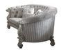 Ivory velvet curved floral sofa with gray legs and matching toss pillows, HomeRoots stationary sofa for elegant living spaces.