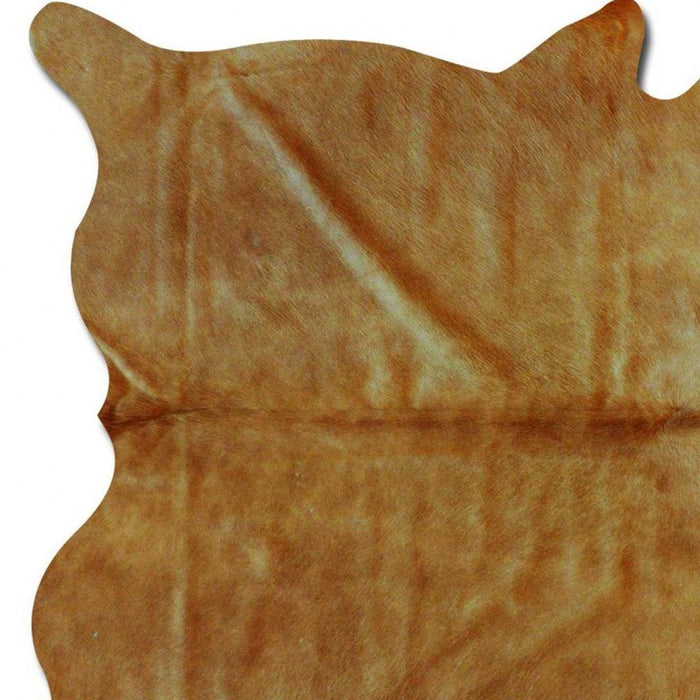 60" x 84" Cowhide Area Rug - Tan