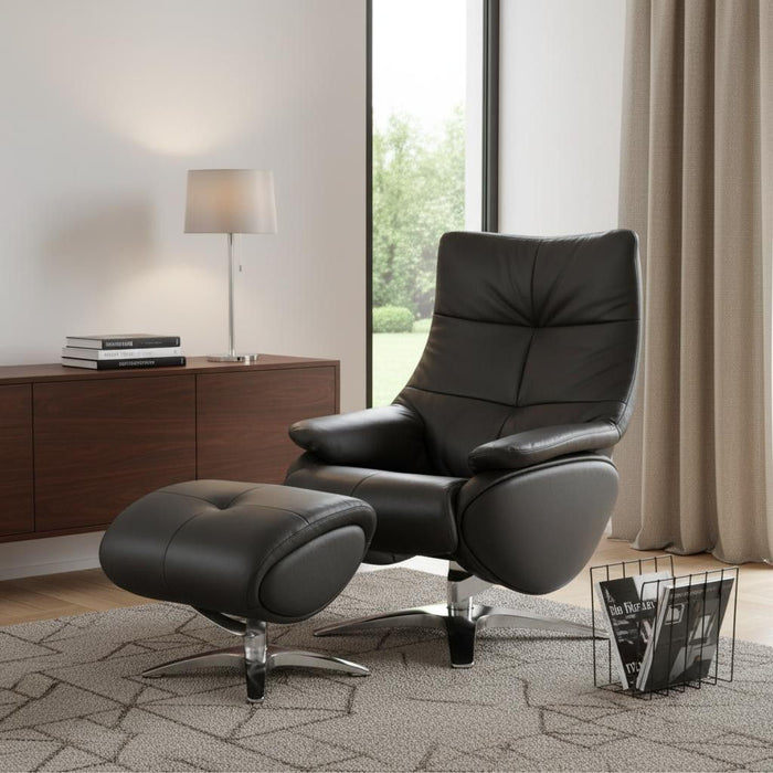 Black genuine leather tufted swivel recliner with matching ottoman by HomeRoots, featuring a plush cushioned design and sturdy base.