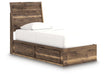 Signature Design by Ashley Chirason panel bed with built-in storage drawers in a modern bedroom setting.