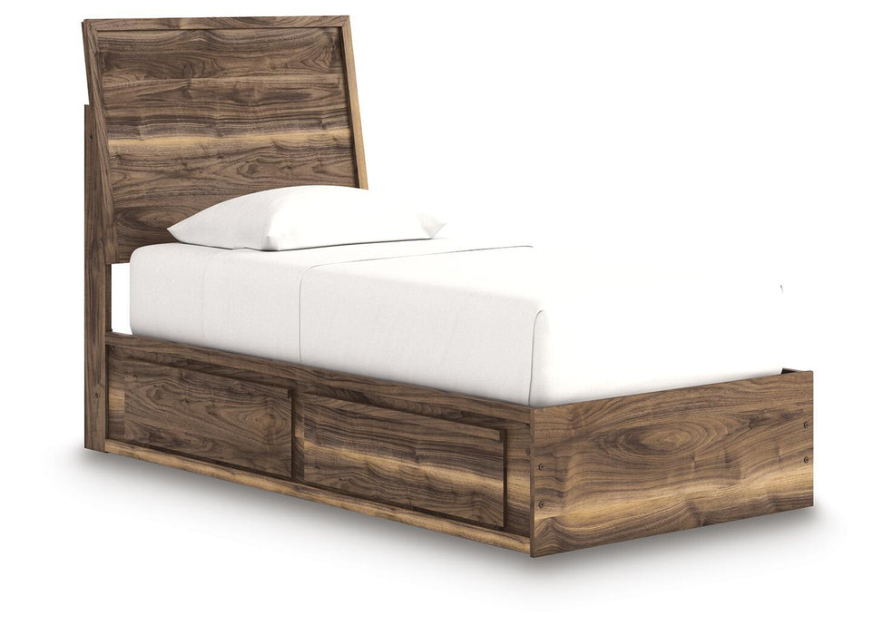 Signature Design by Ashley Chirason panel bed with built-in storage drawers in a modern bedroom setting.