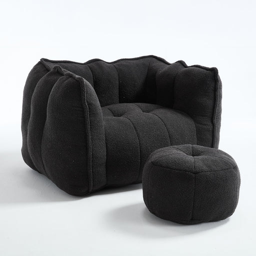 Giga soft bean bag chair with high resilient foam, shown with matching ottoman, in a cozy lounge setting.