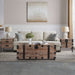Set of three Giga trunk and side tables in antique gray with large storage compartments for living room decor.