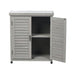Giga potting bench with storage cabinet and metal tabletop for outdoor gardening, shown with gardening tools and potted plants