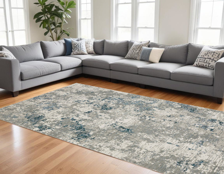 10' X 13' Abstract Power Loom Area Rug - Blue And Beige