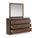 Signature Design by Ashley Janfyn six-drawer dresser with sleek wood finish and modern hardware for bedroom storage.