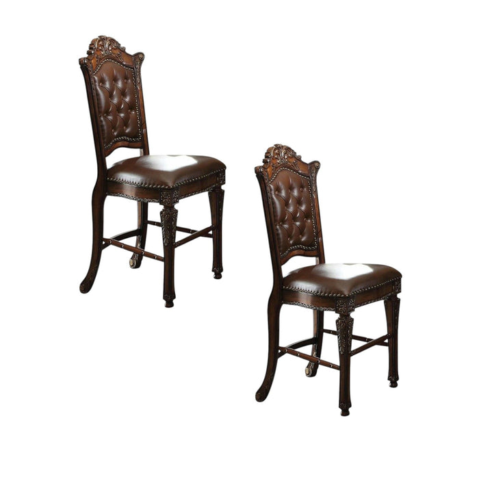 Set of two brown faux leather and solid wood counter height bar chairs with modern design and sturdy construction.