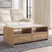 Rectangular cocktail table from Signature Design by Ashley®, featuring a sleek wooden surface and modern style.