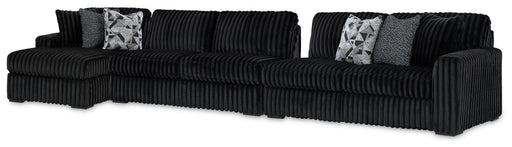 Signature Design by Ashley Midnight Madness 3-piece stationary sectional sofa with plush cushions and modern design.