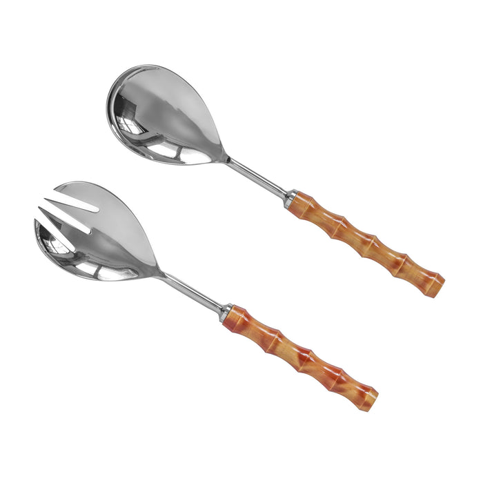 Set of two TOV Furniture stainless steel salad serving spoons with pearl silver finish, designed for elegant flatware serving.