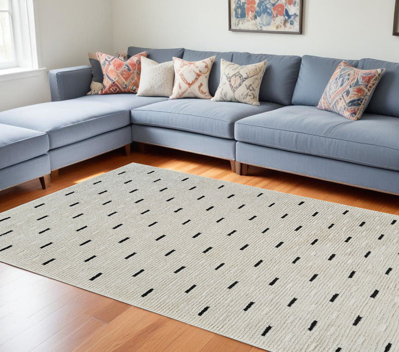8' x 11' Abstract Distressed Polypropylene Area Rug - Cream And Black