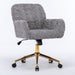 Giga swivel office chair with artificial rabbit hair upholstery, metal base, adjustable height, and 360-degree swivel feature.