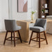 Set of 2 Giga counter height swivel barstools with upholstered fabric seats and 26-inch height, featuring modern design.