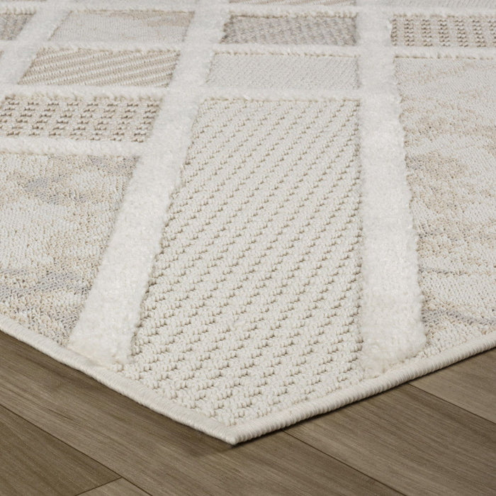 8' x 11' Abstract Distressed Polyester Area Rug - Cream And Beige