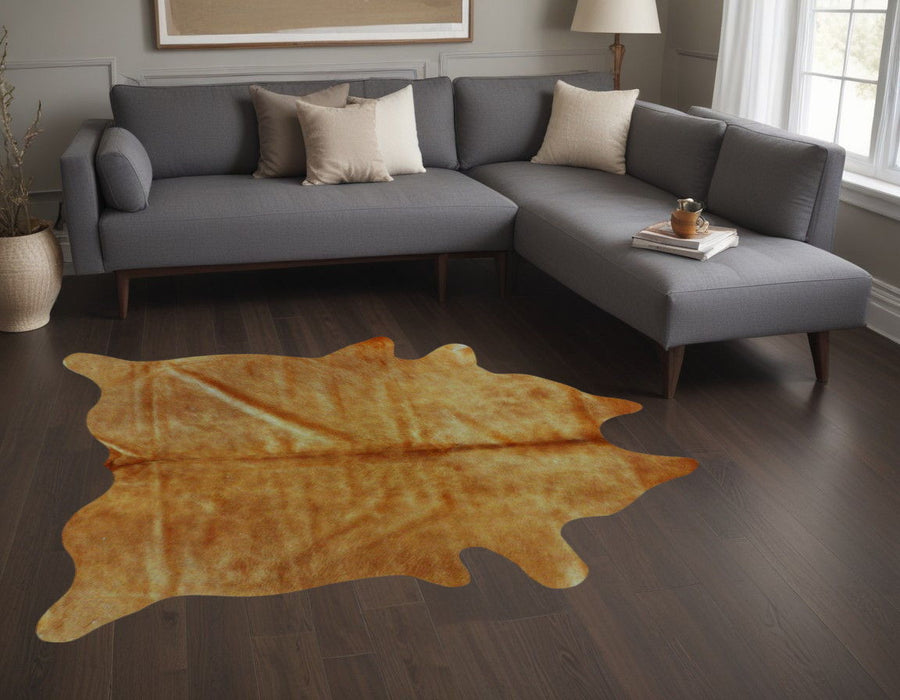 60" x 84" Cowhide Area Rug - Tan